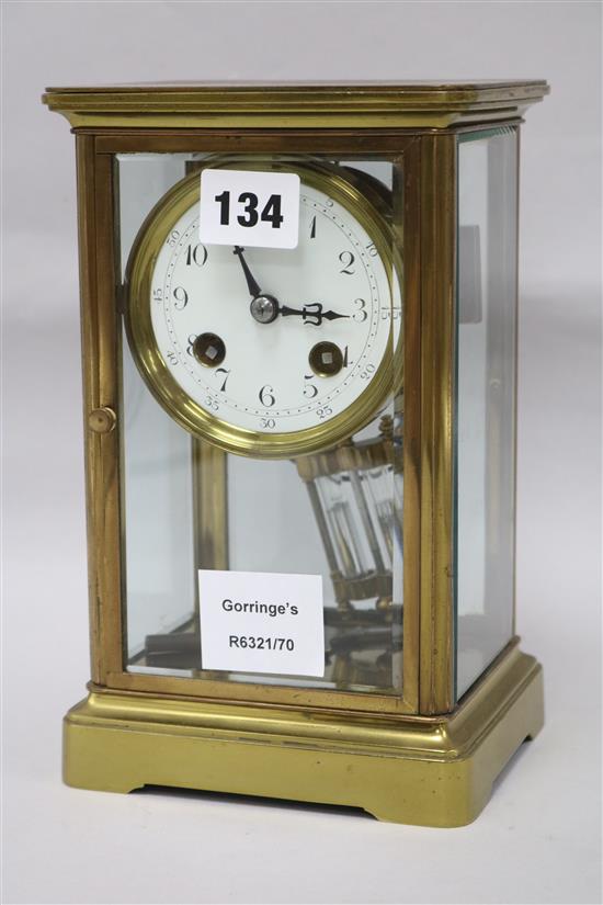 A French brass four glass mantel clock width 14cm height 21cm